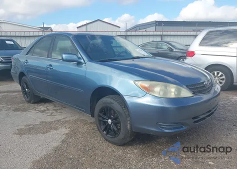2004 Toyota Camry Le z USA, uszkodzony, nr VIN 4T1BE32K14U848988